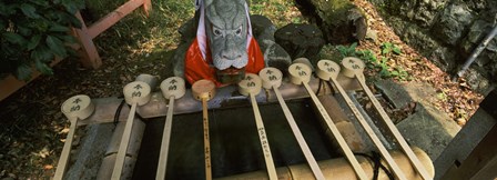 Water ladles in a shrine, Fushimi Inari-Taisha, Fushimi Ward, Kyoto, Kyoto Prefecture, Kinki Region, Honshu, Japan by Panoramic Images art print