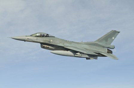 Chilean Air Force F-16 soars through the sky over Brazil by Giovanni Colla/Stocktrek Images art print