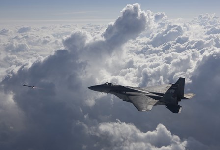 F-15 Eagle Fires an AIM-9X Missile by HIGH-G Productions/Stocktrek Images art print