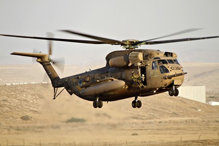 A CH-53 Yasur 2000 of the Israeli Air Force in a rescue demonstration by Ofer Zidon/Stocktrek Images art print