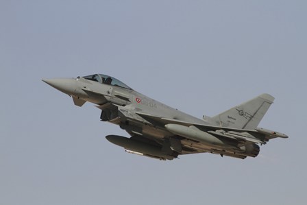 A Eurofighter Typhoon of the Italian Air Force taking off by Ofer Zidon/Stocktrek Images art print