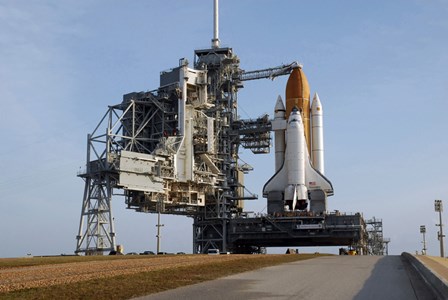 Space Shuttle Discovery on the Launch Pad by Stocktrek Images art print